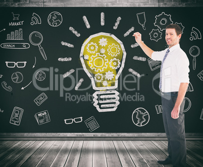 Composite image of businessman standing with his briefcase