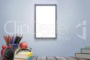 Composite image of school supplies on desk