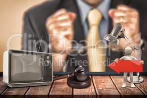 Composite image of closeup of businessman with handcuffed hands