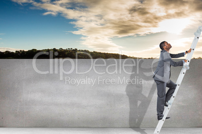 Composite image of businessman climbing up ladder