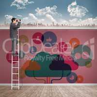 Composite image of businessman looking on a ladder