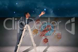 Composite image of businessman climbing up ladder