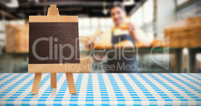 Composite image of part of blue and white tablecloth