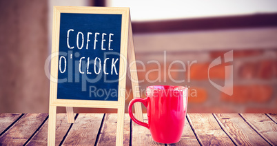 Composite image of red mug on white background