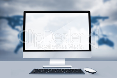 Composite image of image of a desk with computer