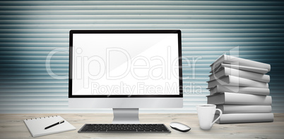 Composite image of image of a desk with computer