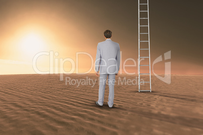 Composite image of rear view of businessman walking on white bac