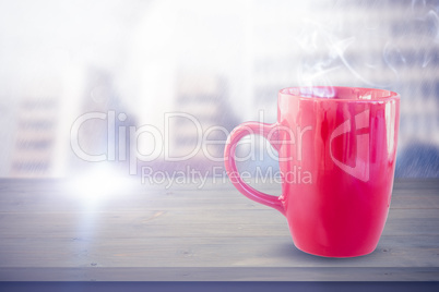 Composite image of red mug on white background