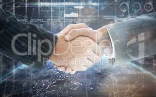 Composite image of business people shaking hands