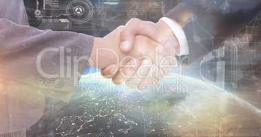 Composite image of handshake between two business people