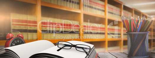 Composite image of school supplies on desk