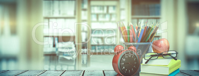 Composite image of school supplies on desk