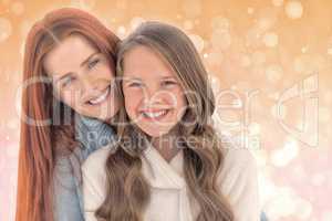Composite image of portrait of happy mother with daughter