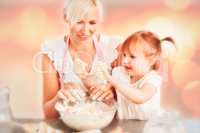 Composite image of simper woman baking cookies with her daughter