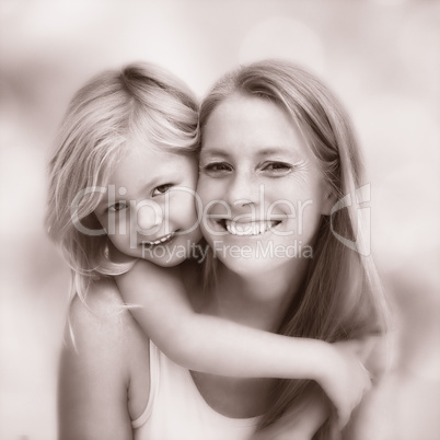 Composite image of cute little girl and mother