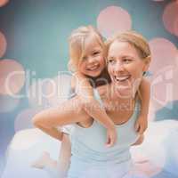 Composite image of cute little girl and mother on bed