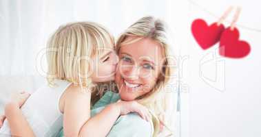 Composite image of Mother and daughter holding each other