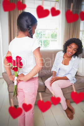 Composite image of daughter giving roses to her mother