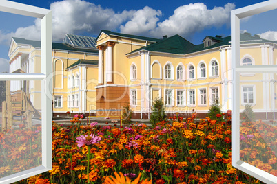 big window overlooking the garden with palace