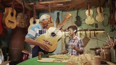 13-Boy Learns Play Guitar With Senior Man Grandpa