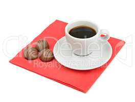 cup of coffee and chocolate candy isolated on white background