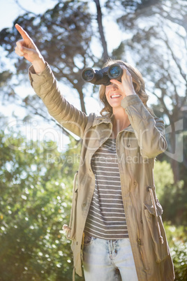 Woman using binoculars