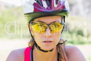 Focused woman cycling