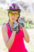 Woman opening her helmet