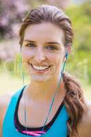 Smiling woman wearing earphones