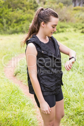 Woman checking her watch