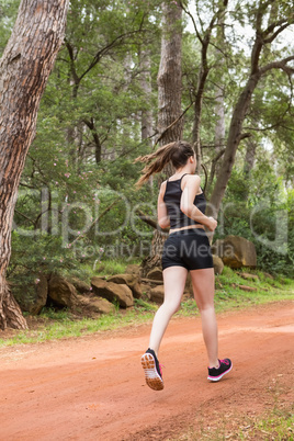 Fit healthy woman jogging