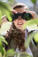 Woman using binoculars