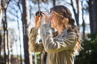 Woman using binoculars