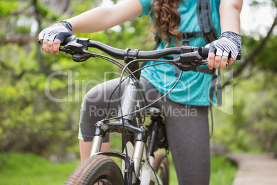 Close-up of woman cycling