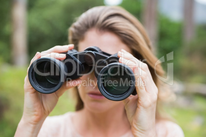 Woman using binoculars