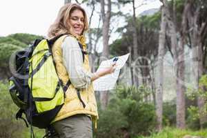 Woman with map and compass