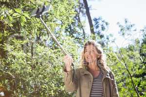 Smiling woman taking selfies