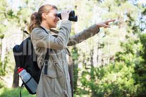 Woman using binoculars