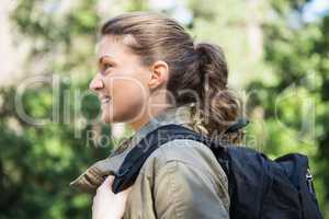 Smiling woman with backpack