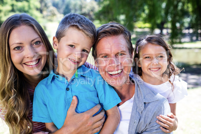 Portrait of a happy family in the park