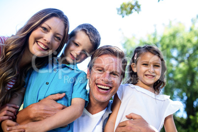 Portrait of a happy family in the park