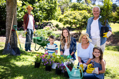 Multi-generation family gardening in the park