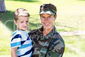 Happy soldier reunited with his son