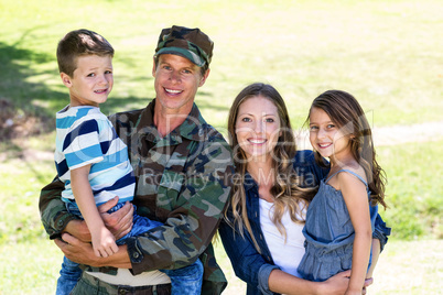 Soldier reunited with his family in the park