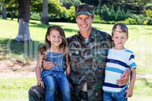 Happy soldier reunited with his son and daughter