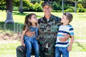 Happy soldier reunited with his son and daughter