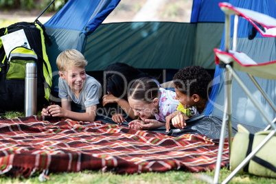 Family having fun in the tent