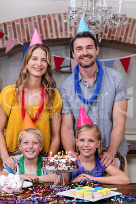 Portrait of family having fun at birthday party