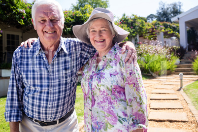 Senior couple embracing in the garden