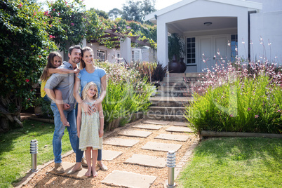 Portrait of family standing together